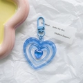 Blue layered acrylic heart keychain featuring hollow heart frames and metal clasp hook - Blue