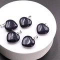Set of five heart-shaped dark blue sandstone pendants with shimmering silver clasps - Blue Goldstone