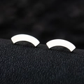 Minimalist silver geometric curved stud earrings in high-polished stainless steel - Half Moon / Silver