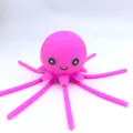 Pink silicone octopus water toy with cute smiley face and spraying holes for bath - New Expression Pink Octopus