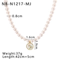 Detail of 18K gold Capricorn shell pendant on long pearl beaded zodiac necklace - Capricorn (NB-N1217-MJ)