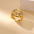 Close-up of golden multi-layered open ring with sparkling zircon stones on beige surface - Adjustable Open / Gold Cross Inlaid Style (G417625)