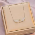 Elegant angel wing pendant necklace in silver finish with pavé stones and crystal center - 6062 Wings Ring / Silver