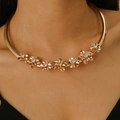 Close-up of a gold metal choker necklace featuring seven rhinestone flower accents on a model - Gold Seven-Flower Rhinestone Choker (3088)