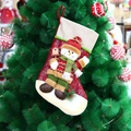Hanging Christmas stocking with 3D snowman doll decoration on a festive holiday tree - 16M053B-Snowman