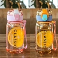 Pink and blue transparent plastic sports water bottles with portable straps and flip caps - Pink + Orange