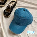 Classic blue washed cotton baseball cap displayed with casual shoes on white fabric - Adult Style (54-59cm) / Blue