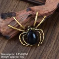 Vintage golden spider brooch with large black gemstone inlay and detailed metal body - Antique Gold Vintage Spider (XZ25152)