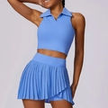 Sky blue sleeveless tennis set featuring a cropped polo top and pleated mini skirt - S / Sky Blue