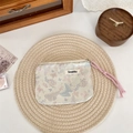 Dettaglio della borsa trucco jacquard con farfalle e cordoncino rosa intrecciato - Piccola Borsa Con Corda Verde Chiaro