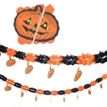 Halloween party garland featuring orange honeycomb balls and pumpkin cutouts - Hanging Pumpkin Garland
