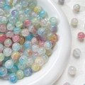 Detailed view of 10mm colorful crackle glass beads for DIY jewelry making in a white bowl - 1# 10mm Multicolor Mix (10 Pcs)