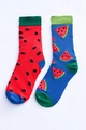 Detail shot of mismatched cotton socks featuring creative red and blue watermelon patterns - One Size / Watermelon