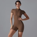Detail of a brown short sleeve yoga bodysuit featuring a front zipper and high elastic fabric - S / Chestnut Brown