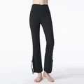 High-waisted black yoga flares with side slits and decorative bow ties for fitness - S / Black