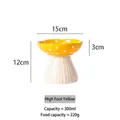 Yellow mushroom ceramic raised cat bowl with dots and cream textured pedestal base - Elevated Yellow Mushroom Bowl