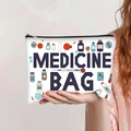 Close-up of canvas medicine bag featuring medical illustrations and zipper closure - Medicine Bag Bold Text Style (jiayingpbb0132)