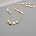 Layered baroque freshwater pearl necklace with thin gold chain in a minimalist design - 8MM Baroque Starry Style