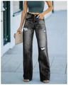 Detail of high waisted distressed wide leg jeans in charcoal grey with knee rips and street style - L / Black