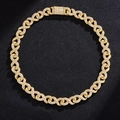 Detail of gold Cuban link chain necklace with micro-paved diamonds and square clasp - 20 Inch (50cm) / Gold