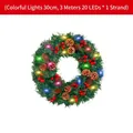 Corona de Navidad 30cm con piñas, bayas y guirnalda de luces LED de colores de 3m - Estilo de Luz Multicolor / 30cm