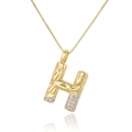 Macro shot of two-tone H-letter pendant necklace with white zircon and box chain - Letter H