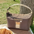 Braune isolierte Kühltasche aus Segeltuch mit Brot-Motiv und verstellbarem Griff - Baguette