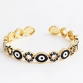 Open gold bangle with colorful evil eye enamel motifs and dark blue zircon flower clusters - Oval Case Black