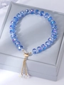Blue crystal bead bracelet with adjustable golden tassel drawstring closure for women - Blue Faceted Crystal Bolo Bracelet (11087)