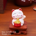 Miniature white Maneki Neko lucky cat statue with gold ingots on wooden base - XY007D Wealth from All Directions Lucky Cat
