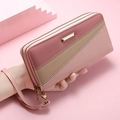 Pink and beige long dual-zipper clutch wallet with wrist strap and gold metal accent - Pink