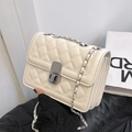 Beige quilted small square crossbody bag with silver chain strap and metal turn-lock - White