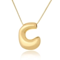 Detailed macro view of high-polished gold capital letter C pendant on a slim link chain - C (D1013)
