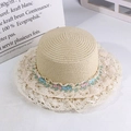 Beige straw sun hat with white lace trim and floral accents on a minimalist background - Three-Color Lace Straw Hat Beige