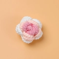 Detailed top view of handmade pink and white crochet rose made from soft wool yarn - Gradient Korean Pink Rose Head