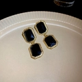 Detail shot of vintage butterfly earrings with black stones and golden textured frames - 27# Silver Pin Earrings - Gold - Black Geometric Gemstone