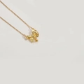 Golden bow pendant necklace with zircon centerpiece and textured fishbone link chain - Bells Bow