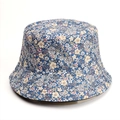 Detailed close-up of light blue floral bucket hat showing cotton canvas texture and print - Light Blue Background Small Colorful Floral (Style M)