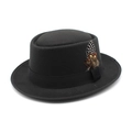 Classic black wool felt pork pie hat with elegant ribbon and feather decoration - Black