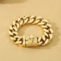 Gold Cuban link bracelet featuring a punk skull embossed square clasp closure - Gold