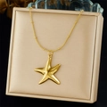 Detailed close-up of a golden starfish pendant necklace on a beaded chain in a gift box - 3D Starfish Style (N3559)