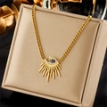 Golden titanium steel evil eye necklace with blue crystal and sunburst pendant - Gold