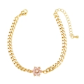 Bracelet fleur dorée avec zircons roses et blancs sur une chaîne cubaine chic - Rose