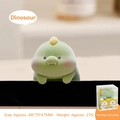 Green dinosaur decorative monitor figure with matte finish and yellow packaging - Fuzzy Dinosaur