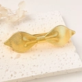 Golden alloy bow hair clip with textured surface on white decorative stone - 01153-5 Narrow Textured Bow Style