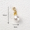 Detail view of 19mm mini heart pearl pendant showing precise size and golden metal parts - Gold Pearl Pendant