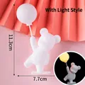 Glow-in-the-dark bear cake topper with balloon, matte white finish, 11.3cm height - White Plastic Balloon Bear with Light