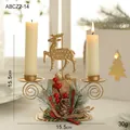 Golden reindeer iron double candle holder with festive pine needles and red berries decor - Hollow Reindeer Double Head Candle Holder