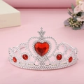 Detailed view of silver birthday crown with large red heart gemstone and beadwork - Red