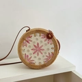Round rattan crossbody bag in natural wood tone with pink petal shell mosaic pattern - Pink Floral